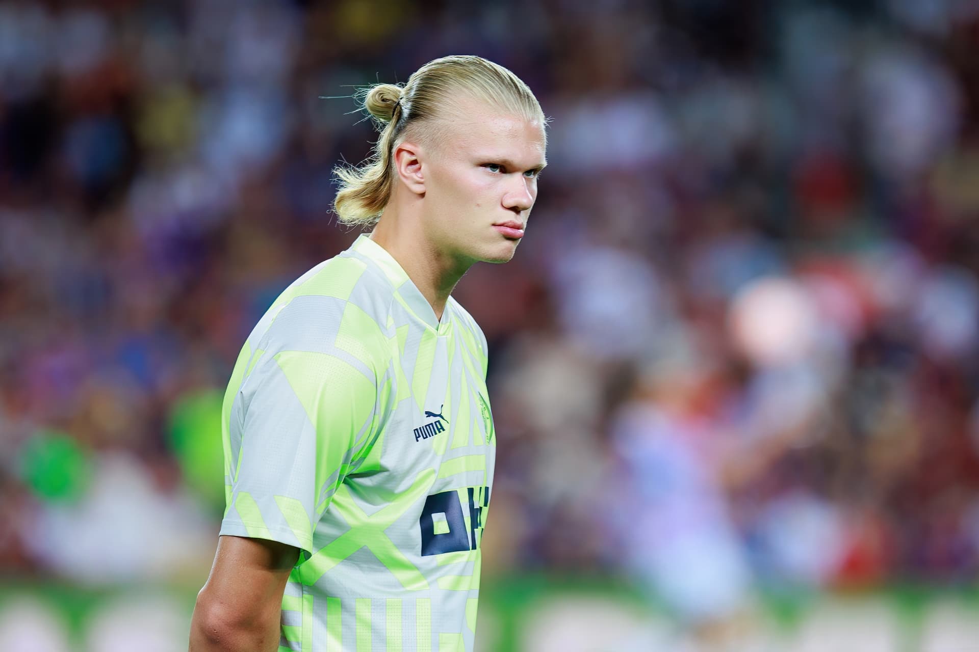 Erling Haaland in Manchester City training wear on a pitch